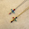 Multi-color oval shaped gemstones cross pendant gold 18k and silver necklace.
